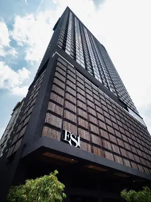 a tall building with the rst logo on it at EST Suites Bangsar by Airhost in Kuala Lumpur