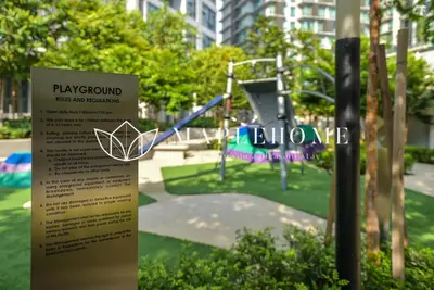 a sign with a playground in a park at The Robertson Kuala Lumpur in Kuala Lumpur