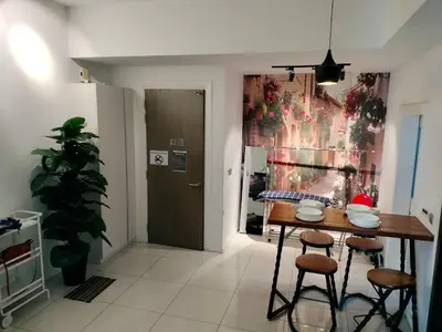 a dining room with a table and chairs and a door at M City Center Jalan Ampang Lakeview KLCC KL Tower Merdeka 118 TRX in Kuala Lumpur