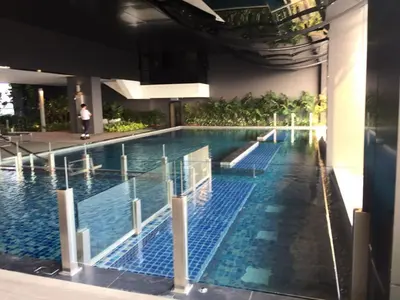 a large swimming pool in a building at M City Center Jalan Ampang Lakeview KLCC KL Tower Merdeka 118 TRX in Kuala Lumpur