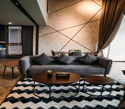 a living room with a couch and a table at Expressionz Suites By iHost Global in Kuala Lumpur