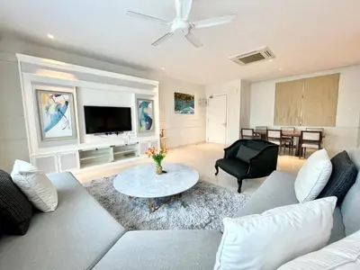 a living room with a couch and a table at KLCC Luxury Condo Damai 88 Near Gleneagles Hospital in Kuala Lumpur