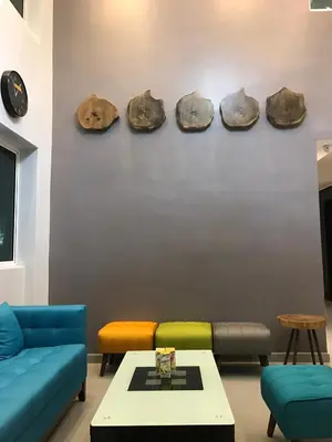 a living room with a couch and a table at Festival Boutique Hotel - Damai Complex in Kuala Lumpur