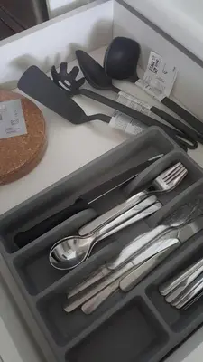 a drawer filled with utensils on a counter at 1room Publika in Kuala Lumpur