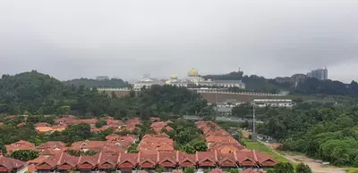 an overhead view of a group of houses with roofs at 1room Publika in Kuala Lumpur