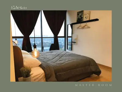 a bedroom with a bed and a large window at KL Gateway Mall - Easy Access to KL Sentral & KLCC in Kuala Lumpur