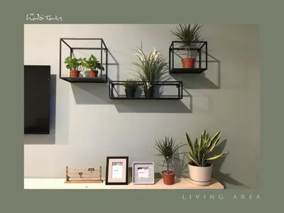 a shelf with potted plants on a wall at KL Gateway Mall - Easy Access to KL Sentral & KLCC in Kuala Lumpur