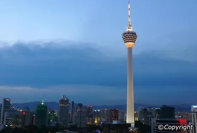 a view of the space needle in a city at night at Perfect Location#2 @Heart of KL City Centre next to Metro MRT in Kuala Lumpur
