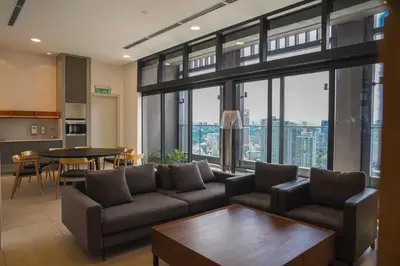 a living room with a couch and a table at Maxhome at Lucentia Bukit Bintang City centre KL in Kuala Lumpur