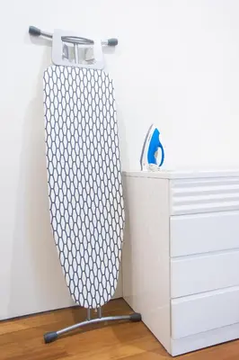 a white dresser with a mirror next to a drawer at Soho Suites KLCC in Kuala Lumpur