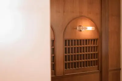 a door to a closet with a light on it at The Très Hotel in Kuala Lumpur