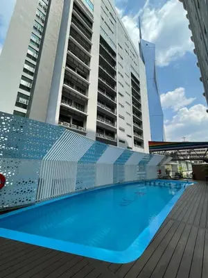 a swimming pool on the deck of a cruise ship at AnCasa Hotel Kuala Lumpur, Chinatown in Kuala Lumpur