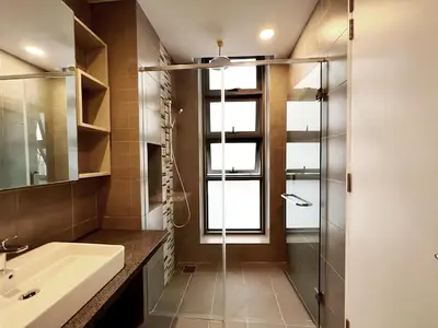 a bathroom with a sink and a shower at The Robertson Bukit Bintang in Kuala Lumpur