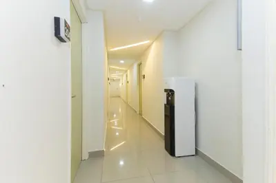 a hallway of a building with a refrigerator in it at Hotel O Kl Centre Point in Kuala Lumpur