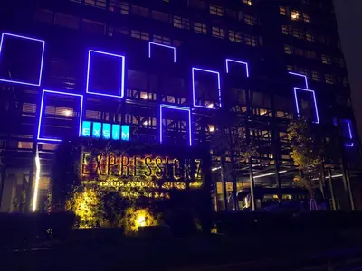 a building with blue lights on the side of it at Expressionz Suites near KLCC, IJN by Wodages in Kuala Lumpur
