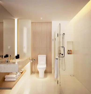 a bathroom with a toilet and a shower at Regalia Upper View Hotel in Kuala Lumpur