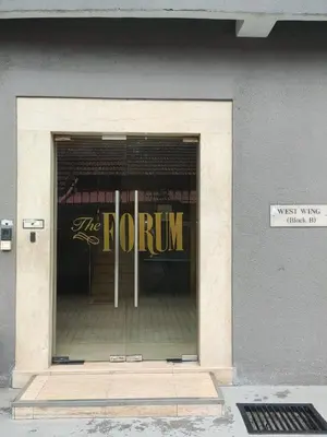 a window of a store with a sign in it at The FORUM condominium, Jalan Inai, Off Jalan Tun Razak in Kuala Lumpur
