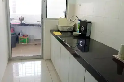 a kitchen with a counter with a sink and a mirror at PV21 Setapak, Share House Room Only in Kuala Lumpur