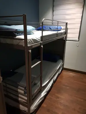 a couple of bunk beds in a room at Sunway Velocity V Residence Suites in Kuala Lumpur