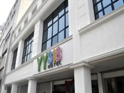 a white building with a m o motel sign on it at YY318 Hotel Bukit Bintang in Kuala Lumpur