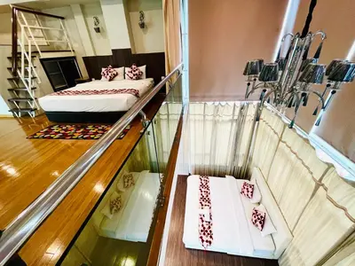 a room with a bed on a glass floor at Sky Hotel @ Pudu in Kuala Lumpur