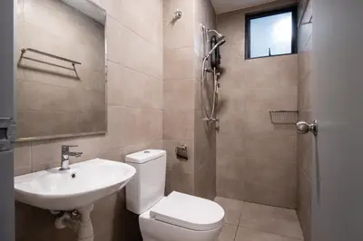 a bathroom with a toilet and a sink and a shower at 3 Rooms Elegant Minimalist Design Setapak 15min KLCC in Kuala Lumpur