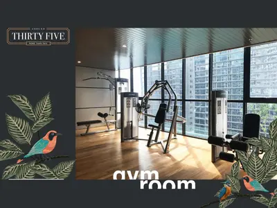 a fitness room with a gym with a bird at KL Gateway Premium Residence - Easy LRT Access in Kuala Lumpur