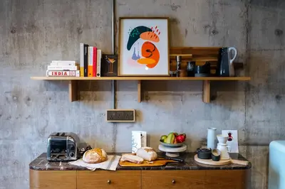 a counter with a table with food on it at KLoe Hotel in Kuala Lumpur