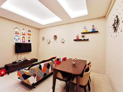 a dining room with a table and chairs and a skylight at Dorsett Residences Sri Hartamas in Kuala Lumpur