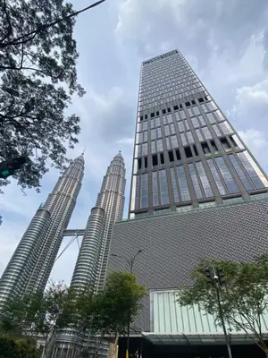 a group of tall buildings in a city at Tropicana The Residence, KLCC in Kuala Lumpur