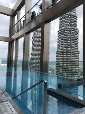 a view of a large building with a swimming pool at Tropicana The Residence, KLCC in Kuala Lumpur