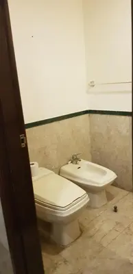 a bathroom with a toilet and a sink at New Town Suite At Times Square in Kuala Lumpur