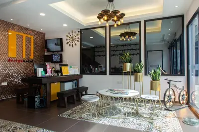 a store with a table and chairs in a room at M Design Hotel @ Taman Pertama in Kuala Lumpur