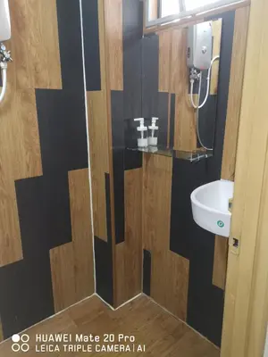 a bathroom with a toilet and a sink at Yeob Bay hotel Ampang in Ampang