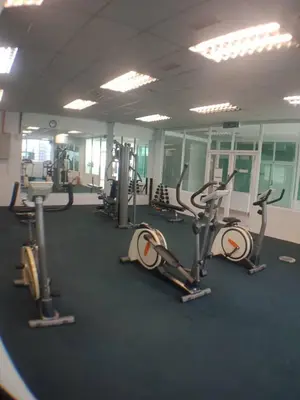 a gym with several treadmills and elliptical machines at VUE RESIDENCE SERVICE SUITE - Studio 3 pax in Kuala Lumpur
