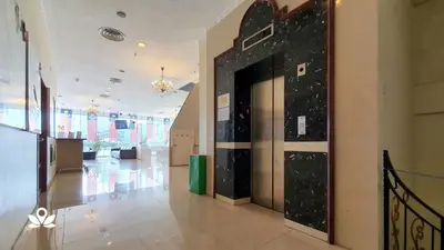 a lobby with a large door in a building at SCC Hotel City Centre in Kuala Lumpur