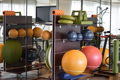 a room filled with different types of balls on shelves at Lanson Place Bukit Ceylon in Kuala Lumpur