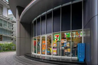 a store front of a building with signs in the window at Vortex Suites KLCC by BlackNest in Kuala Lumpur