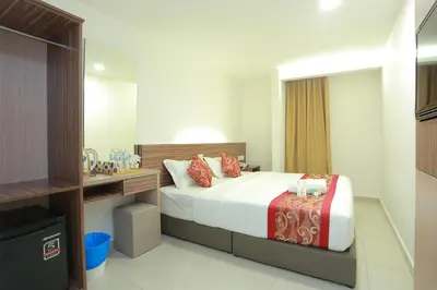 a hotel room with a bed and a sink at Bitz Bintang Hotel in Kuala Lumpur