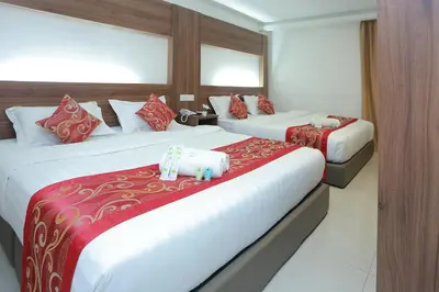 a hotel room with two beds with stuffed animals on them at Bitz Bintang Hotel in Kuala Lumpur