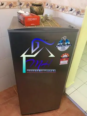 a trash can with a sign on the side of it at Mahasa Homestay Kuala Lumpur in Kuala Lumpur