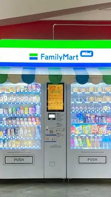 a familymart refrigerator in a store with drinks at Cozy Studio 10min to KLCC next to Hospital Gleneagle Jalan Ampang in Kuala Lumpur