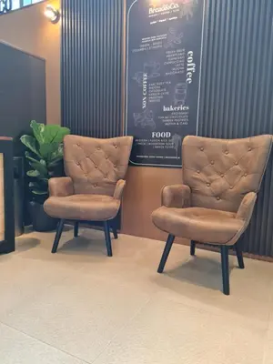 two chairs sitting next to each other in a room at 3 Towers 10min to KLCC next to Hospital Gleneagle in Kuala Lumpur