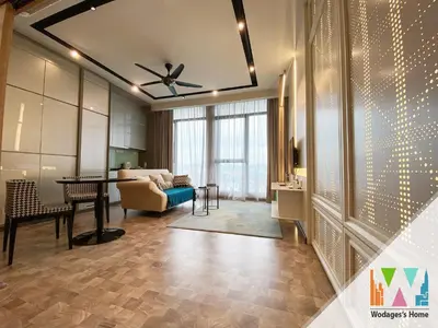 a living room with a couch and a table at KLCC Expressionz by WGS in Kuala Lumpur