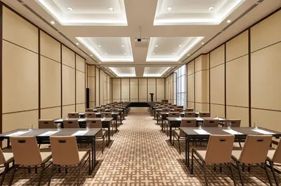 a large room with tables and chairs in it at Four Points by Sheraton Kuala Lumpur, Chinatown in Kuala Lumpur