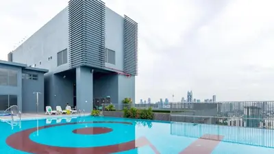 a swimming pool on the roof of a building at 7 mins KLCC next to Hospital Gleneagle in Kuala Lumpur