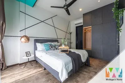 a bedroom with a large bed and a ceiling at WGS Suites at KLCC in Kuala Lumpur