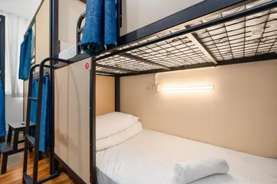 a couple of bunk beds in a room at Amethyst KLCC in Kuala Lumpur