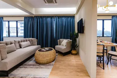 a living room with a couch and a table at Urban Living Residence in Kuala Lumpur