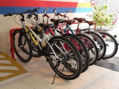 a row of bikes parked next to each other at Akar Hotel Kampung Baru in Kuala Lumpur